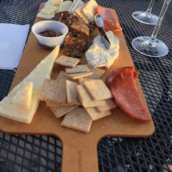Elmaro Vineyard - Cheese plate with a mix of local and exotic snacks - Wineries Near Me - Trempealeau, Wisconsin