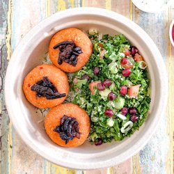 Sumac - Red Lentil Balls Rice Bowl - Vegetarian. Comes with fresh herbs yogurt sauce and hot sauce