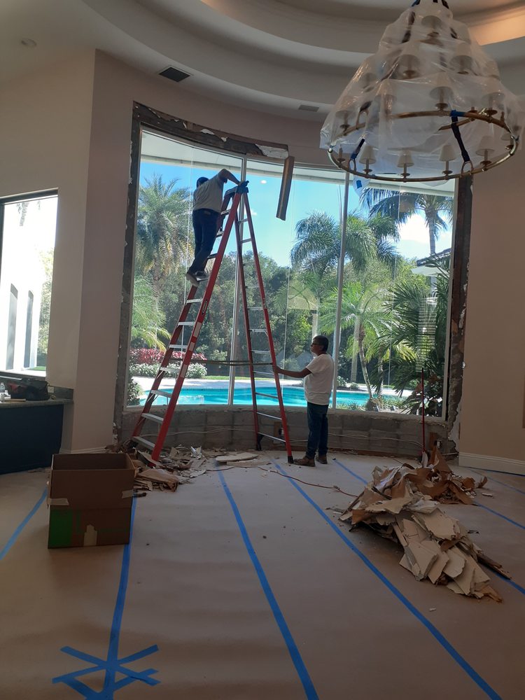 Slide of Leo Construction Roofing