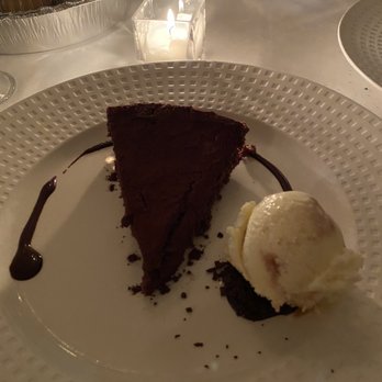Mirabelle Restaurant & Tavern - Dusted chocolate mousse cake with caramel ice cream - New American Near Me - Stony Brook, New York Mirabelle Restaurant & Tavern - Dusted chocolate mousse cake with caramel ice cream - New American Near Me - Stony Brook, New York