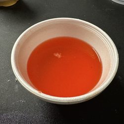China 1 - Watered down red sauce to dip your chicken in. Totally disgusting. That's not how it's supposed to look.