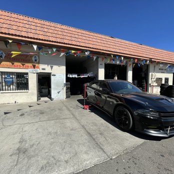 Johnnys Tires Shop - Rear wheels removed and ready for replacement - Tires Near Me - Glendale, Arizona Johnnys Tires Shop - Rear wheels removed and ready for replacement - Tires Near Me - Glendale, Arizona