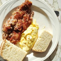 Barbara’s Maple Haven - Breakfast special: One egg scrambled with cheese (minus a bite), salt rising bread toast, and corned beef hash.  Excellent !