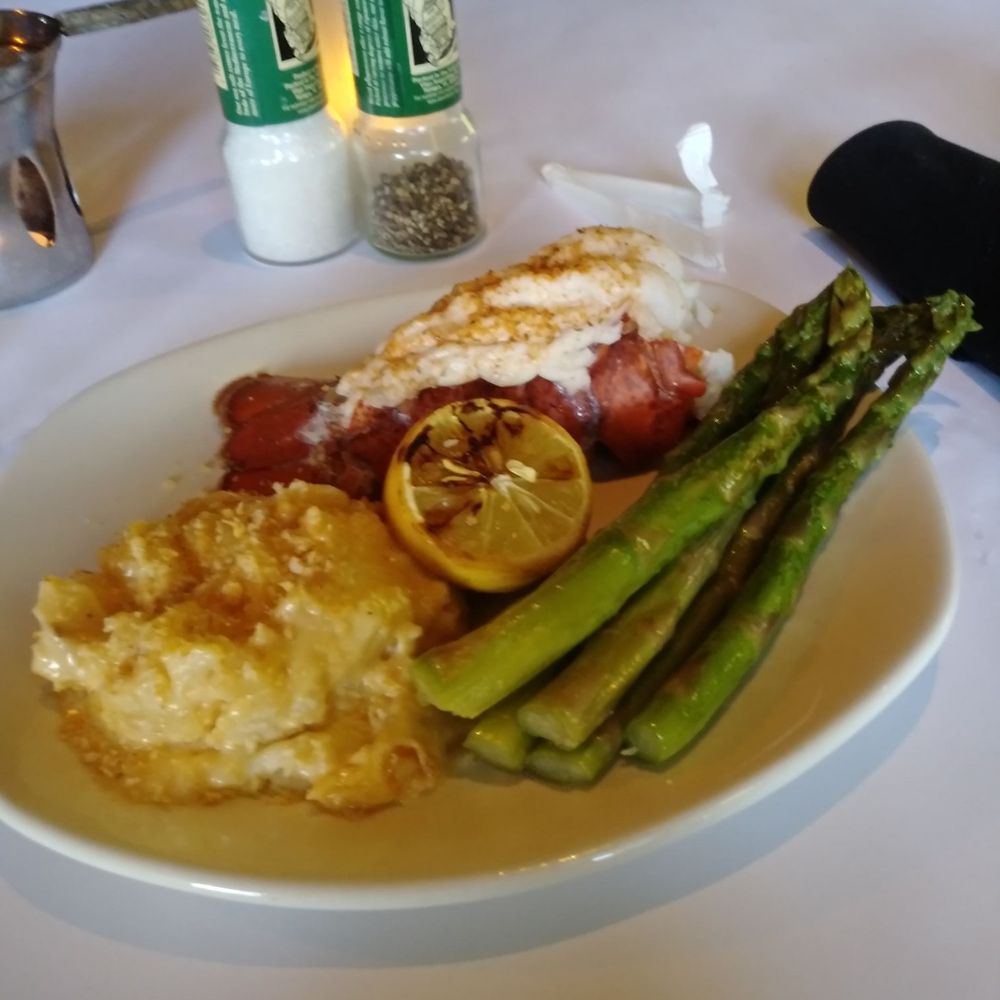 Bonefish Grill - Single lobster tail with au gratin pitaties and asparagus - Seafood Near Me - Tampa, Florida Bonefish Grill - Single lobster tail with au gratin pitaties and asparagus - Seafood Near Me - Tampa, Florida