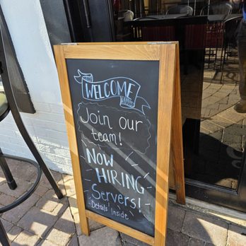 Gusto’s Pizza - A sidewalk sign near the entrance of the restaurant. - Pizza Near Me - Salem, Virginia