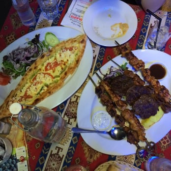 Mado Cafe & Restaurant - Cheesy pide and mixed grill at Mado restaurant. - Turkish Near Me - South Brisbane, QLD