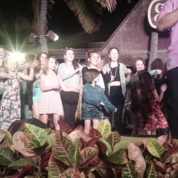 Germaine's Luau - Our 5 year old in complete Heaven dancing on stage with the performers! - Hawaiian Near Me - Kapolei, Hawaii Germaine's Luau - Our 5 year old in complete Heaven dancing on stage with the performers! - Hawaiian Near Me - Kapolei, Hawaii