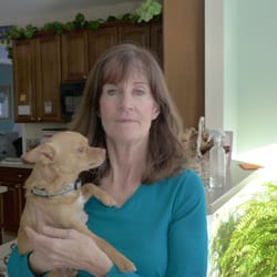 Connie Calaway with Hands That Heal Masssage Therapy - Connie and her fluffy friend in her Massage place of peace