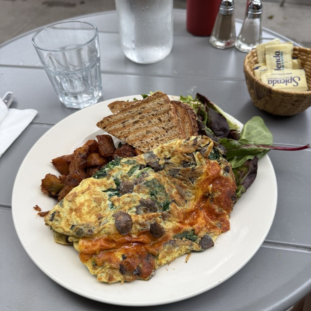 Omelette with mushrooms spinach and cheese