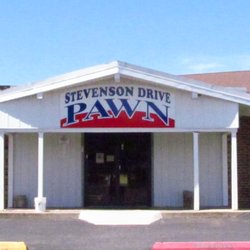 Nice clean and well lit up parking lot and clean shop[ inside