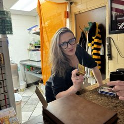 Clipper Gap-Oliver's Station - Whitney, bartending, feeding us and playing games.