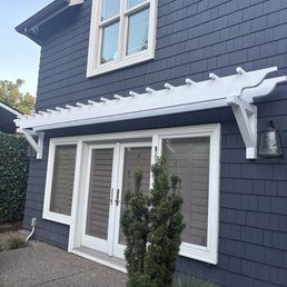 Replace the old decorative trellis at my house and installed a new one that looked much nicer and classier Replace the old decorative trellis at my house and installed a new one that looked much nicer and classier
