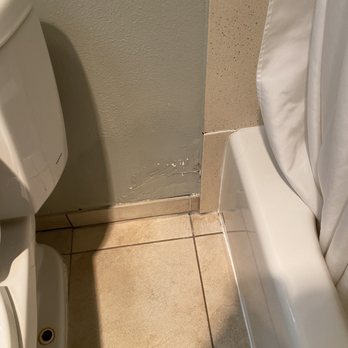 Mariposa Inn & Suites - Weird scuffs and damaged walls between the toilet and shower. - Hotels Near Me - Monterey, California Mariposa Inn & Suites - Weird scuffs and damaged walls between the toilet and shower. - Hotels Near Me - Monterey, California