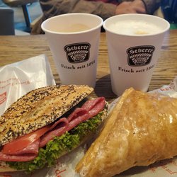 Wiener Feinbäcker - Black coffee + salami sandwich and apple pastry + Latte on right