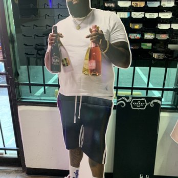 OST Liquor - Poster Board of Rick Ross - Beer, Wine & Spirits Near Me - Houston, Texas OST Liquor - Poster Board of Rick Ross - Beer, Wine & Spirits Near Me - Houston, Texas