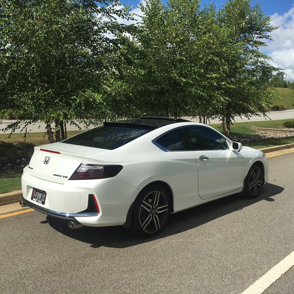 Windows tinted, taillights tinted, and roof wrapped by Tint Masters Windows tinted, taillights tinted, and roof wrapped by Tint Masters