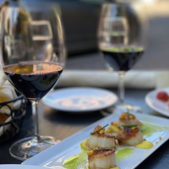 Brickhouse - Bend - a plate of scallops and a glass of wine - American Near Me - Bend, Oregon Brickhouse - Bend - a plate of scallops and a glass of wine - American Near Me - Bend, Oregon