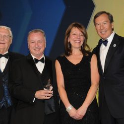 Express Employment Professionals - On 3/2, Owners David Willett (2nd from L) & Sue McNamara were honored at Express's International Leadership Conference by Express Co-Owners.