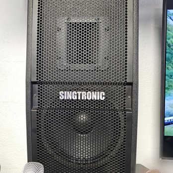 Singtronic - a microphone and a speaker on a table - Electronics Near Me - Garden Grove, California Singtronic - a microphone and a speaker on a table - Electronics Near Me - Garden Grove, California