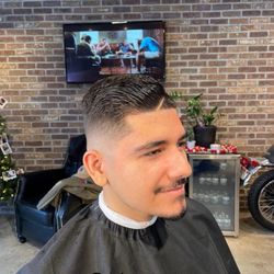 Richies Barber Shop - Mid to high skin fade comb over with hard part