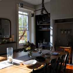 Full & Happy - The Full & Happy Cooking Studio features reclaimed wood tables made from floorboards from the Philadelphia Brewing Company