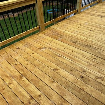 Infiniti Roofing & Remodeling - a deck with a wooden decking - Roofing Near Me - Canton, Georgia