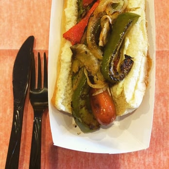 Good Dog - The Doggfather: pesto & garlic cream sauce, topped with grilled peppers & onions - Caterers Near Me Good Dog - The Doggfather: pesto & garlic cream sauce, topped with grilled peppers & onions - Caterers Near Me
