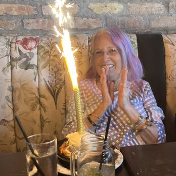 FINKA Table & Tap - The birthday girl enjoying her bread pudding almond dessert cake and her cappuccino . - Asian Fusion Near Me - Miami, Florida