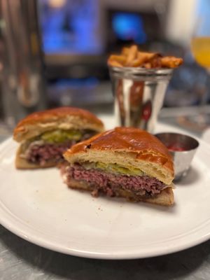 Photo of Guildhall - Glencoe, IL, US. GUILDHALL BURGER: Prime beef, havarti, grilled onion, house pickles, garlic aioli, toasted brioche, fries