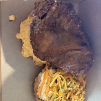World Street Kitchen Truck - Moroccan chicken sandwich after receiving it. - Food Trucks Near Me - Minneapolis, Minnesota World Street Kitchen Truck - Moroccan chicken sandwich after receiving it. - Food Trucks Near Me - Minneapolis, Minnesota