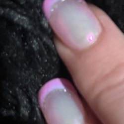 Warwick Nails and Spa - Natural base, ballet slipper pink French tip, dusted in pink chrome and silver accent line.