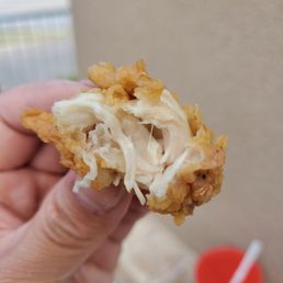 Inside of a chicken finger Inside of a chicken finger