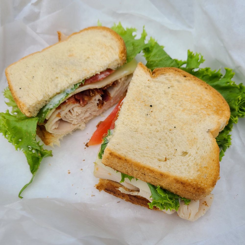 Mozzo Deli - Honey Slide with turkey, bacon, Swiss cheese, lettuce, tomato and honey mayo - Delis Near Me - Charleston, South Carolina