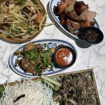 Som Tum Jinda - Papaya salad, chicken, frog legs, lamb - Thai Near Me - Toronto, Ontario Som Tum Jinda - Papaya salad, chicken, frog legs, lamb - Thai Near Me - Toronto, Ontario