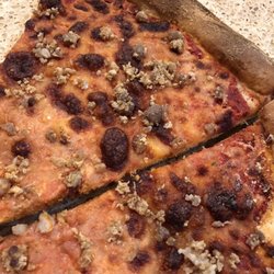 Clemenza's Gourmet Brick Oven Pizza - Clemenza Pizza, ordered 2 pies.   They just threw toppings on a cheese pizza and expected that to be OK. Sausage is just sitting on top.