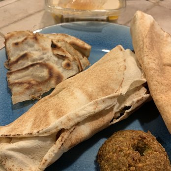 Cedars Restaurant - Chicken shawarma wrap, a falafel, arayis, pita, and hummus - Lebanese Near Me - Memphis, Tennessee