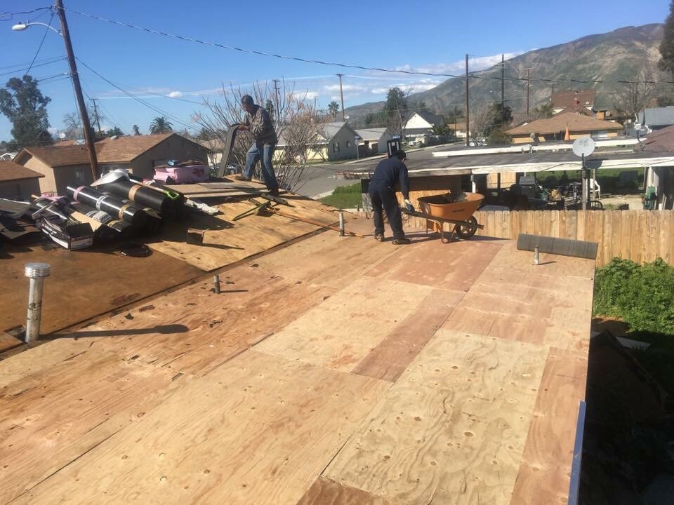 Slide of Tony and Velasco Roofing Constructions