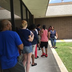 Justice Of The Peace Precinct 4 - Standing outside to get registration.