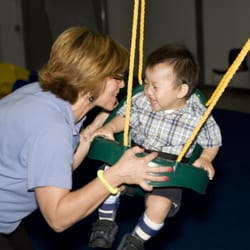 BDI Playhouse Pediatric Therapy - Fun in the swing
