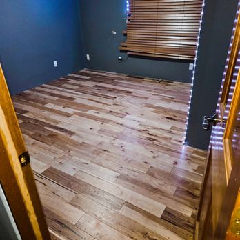 Against The Grain Flooring And Remodeling - a hardwood floor in a room - Flooring Near Me Against The Grain Flooring And Remodeling - a hardwood floor in a room - Flooring Near Me