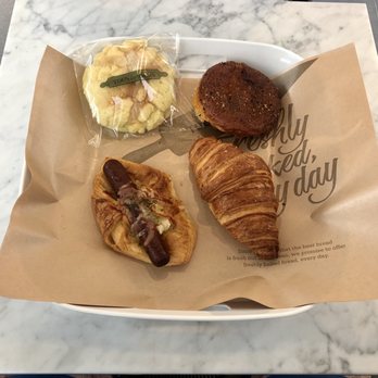 Tous Les Jours - Clockwise from top left: Melon pan, curry croquette, croissant, onion sausage roll - Coffee & Tea Near Me - Malden, Massachusetts Tous Les Jours - Clockwise from top left: Melon pan, curry croquette, croissant, onion sausage roll - Coffee & Tea Near Me - Malden, Massachusetts