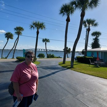 Driftwood Motel - My honey with the view from the parking area with the bridge & Indian Rive behind - Hotels Near Me - Jensen Beach, Florida Driftwood Motel - My honey with the view from the parking area with the bridge & Indian Rive behind - Hotels Near Me - Jensen Beach, Florida