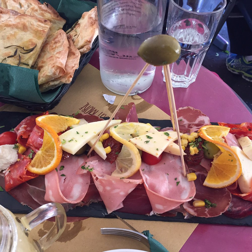 Ombre Rosse - Selection of cheeses and salamis with bread - Jazz & Blues Near Me - Rome, RM Ombre Rosse - Selection of cheeses and salamis with bread - Jazz & Blues Near Me - Rome, RM