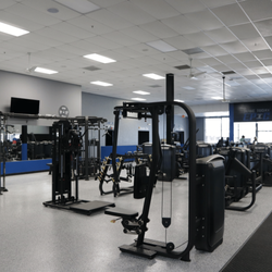 Strength training machines at Epic Health & Fitness Port Richey for pulldowns, seated rows, and full-body resistance workouts.