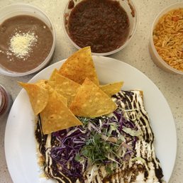Enchiladas with cheese & mole sauce. So delicious!