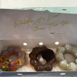 Fruity pebbles, cookies and cream, and matcha donut Fruity pebbles, cookies and cream, and matcha donut