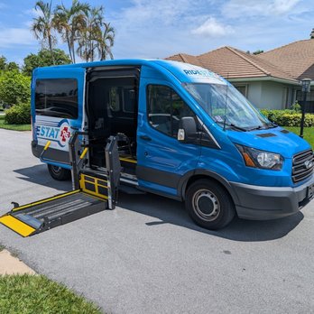 RideStat - Showcasing the wheelchair lift on one of RideStat's vans. - Medical Transportation Near Me - Fort Lauderdale, Florida RideStat - Showcasing the wheelchair lift on one of RideStat's vans. - Medical Transportation Near Me - Fort Lauderdale, Florida