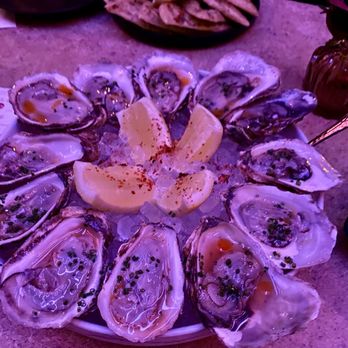Devil May Care - Oysters. $2 each on HH. - Lounges Near Me - Austin, Texas