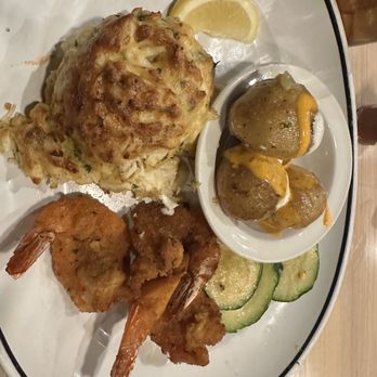 By The Docks Restaurant - By the Docks Award Winning Colossal Crab Cakes - Single , fried shrimp, potatoes, and zucchini - Seafood Near Me - Middle River, Maryland By The Docks Restaurant - By the Docks Award Winning Colossal Crab Cakes - Single , fried shrimp, potatoes, and zucchini - Seafood Near Me - Middle River, Maryland
