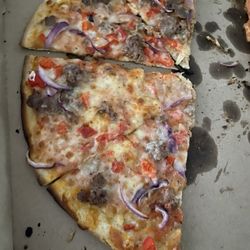 AJ's Wood Grill Pizza - The Speciality house made sausage,red pepper,red onion. you need to look very close to see the diced peppers